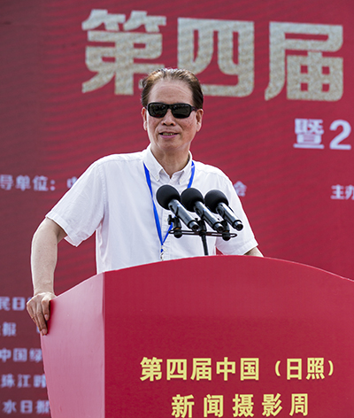 中国新闻摄影学会会长徐祖根出席开幕式并致辞。.jpg